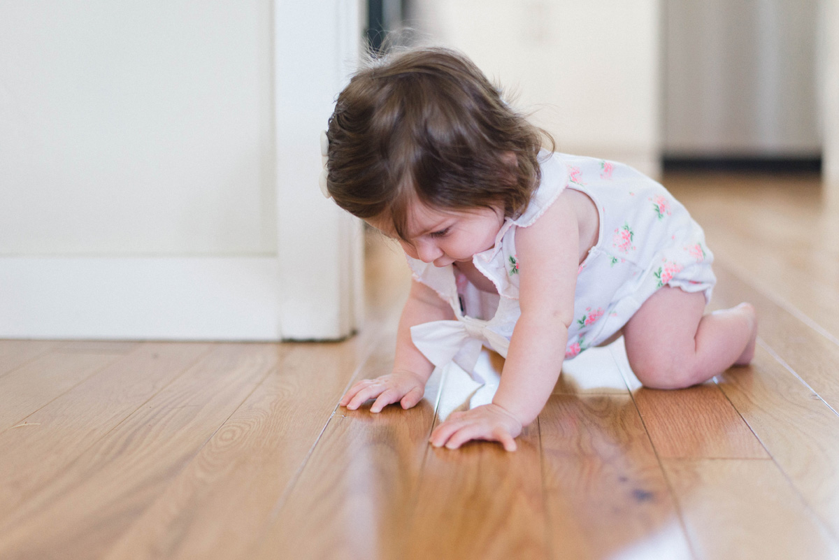 Baby crawling in new house baby crawling in a new family home