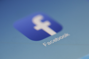 The blue Facebook app on a blue digital screen.
